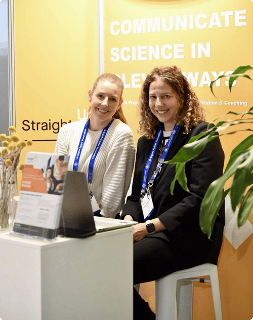 Hellie and Damia at the Straight Up booth at an event